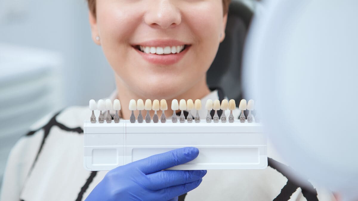 Young woman visiting dentist - Friendly Dental of Worcester