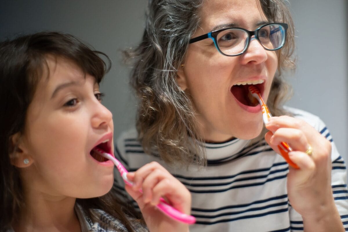 Family Cosmetic Dentistry Worcester - a family smiling at the dentist - Friendly Dental of Worcester Family cosmetic dentistry in Worcester - mother and daughter smiling